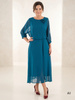 Elegancka zielona sukienka rozkloszowana maxi – kobiecy fason z efektownym rozcięciem 38657