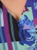 Kwiatowa sukienka midi z kopertowym dekoltem – wiązanie w pasie i rozkloszowany dół 36886
