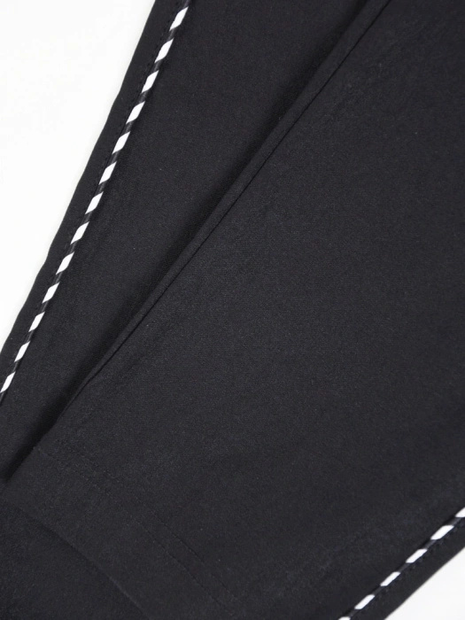 Czarne cygaretki damskie plus size z kontrastowymi lampasami – wysmuklające fasonem, z wygodną gumką w pasie 35145