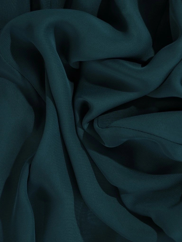 Elegancka sukienka rozkloszowana w odcieniu butelkowej zieleni – kobiecy fason modelujący sylwetkę 22691