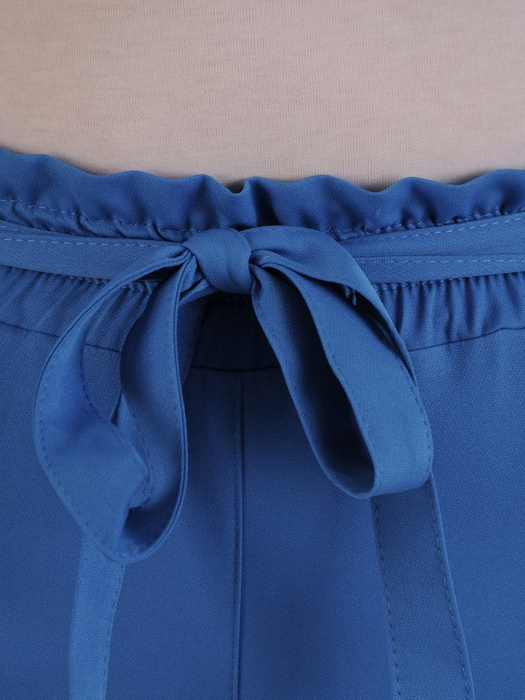 Niebieskie spodnie z tkaniny 20923.