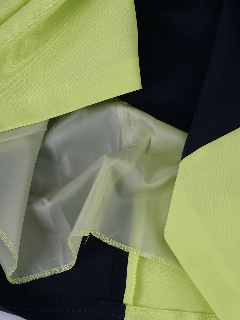 Elegancka sukienka trapezowa midi granatowa z pistacją – kobiecy krój tuszujący biodra 2906