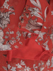 Szyfonowa sukienka z guzikami przy dekolcie w kwiaty 27293