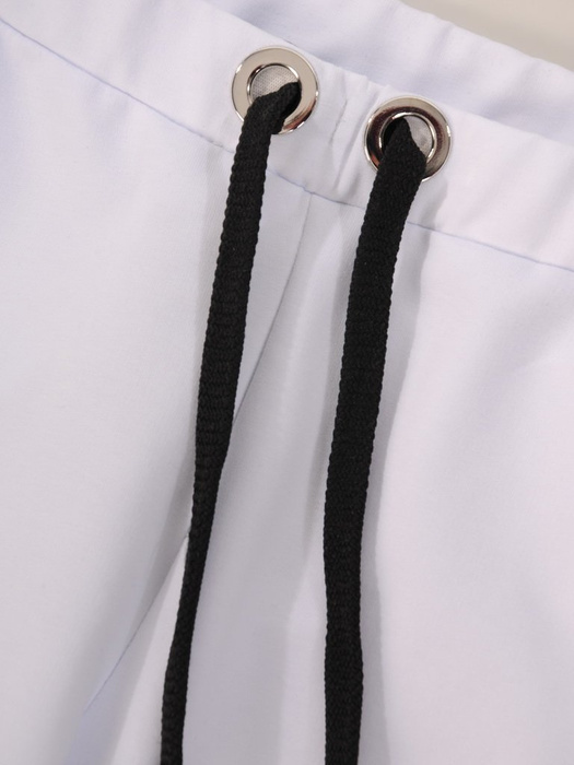 Dzianinowe białe spodnie z lampasem 28269