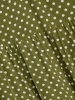 Wiskozowa sukienka rozkloszowana w grochy khaki – fason podkreślający talię i kobiece kształty 41410