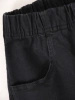 Czarne eleganckie dzwony damskie z gumką w pasie – wysmuklające nogi, idealne dla sylwetki plus size 36894