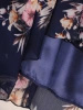 Elegancka wzorzysta sukienka midi z dekoltem w serek – rozkloszowany fason pięknie wysmuklający sylwetkę 28176