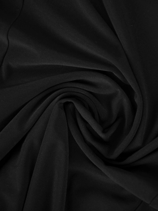 Elegancka czarna sukienka rozkloszowana z żabotem – kobiecy krój tuszujący biodra 36244