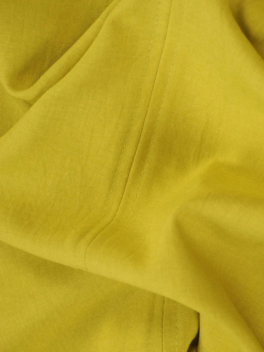 Elegancka sukienka wizytowa o prostym kroju w kolorze limonki – modelujące sylwetkę przeszycia 35744