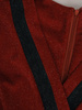 Kopertowa sukienka z kontrastowymi lamówkami 18742, ruda kreacja z dzianiny.